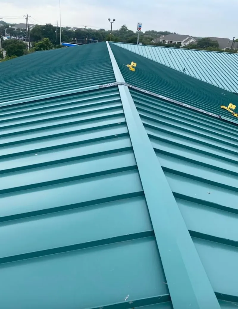 Green commercial metal roof ridge and valley for Metal Roof Repair in Boiling Spring Lakes